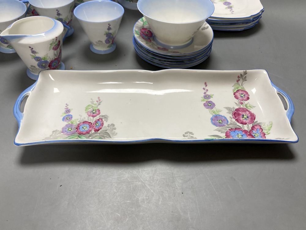 A Shelley 12019 Hollyhocks pattern part tea set